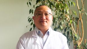 Dr Hongyi Zhang at AcuMeic Centre for acupuncture and Chinese Medicine in Camden, London